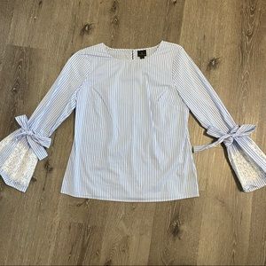 Baby blue pin stripe bell sleeve top